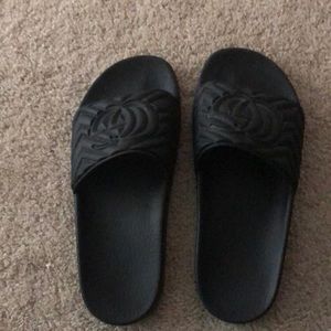 Black Gucci slides come with the box and duster bag.